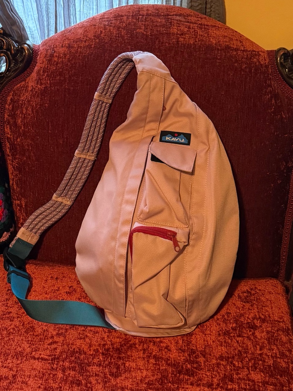 Kavu Pink Sling Backpack with Teal Strap and Red Zipper